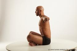 Underwear Man Black Sitting poses - simple Muscular Bald Sitting poses - ALL Academic